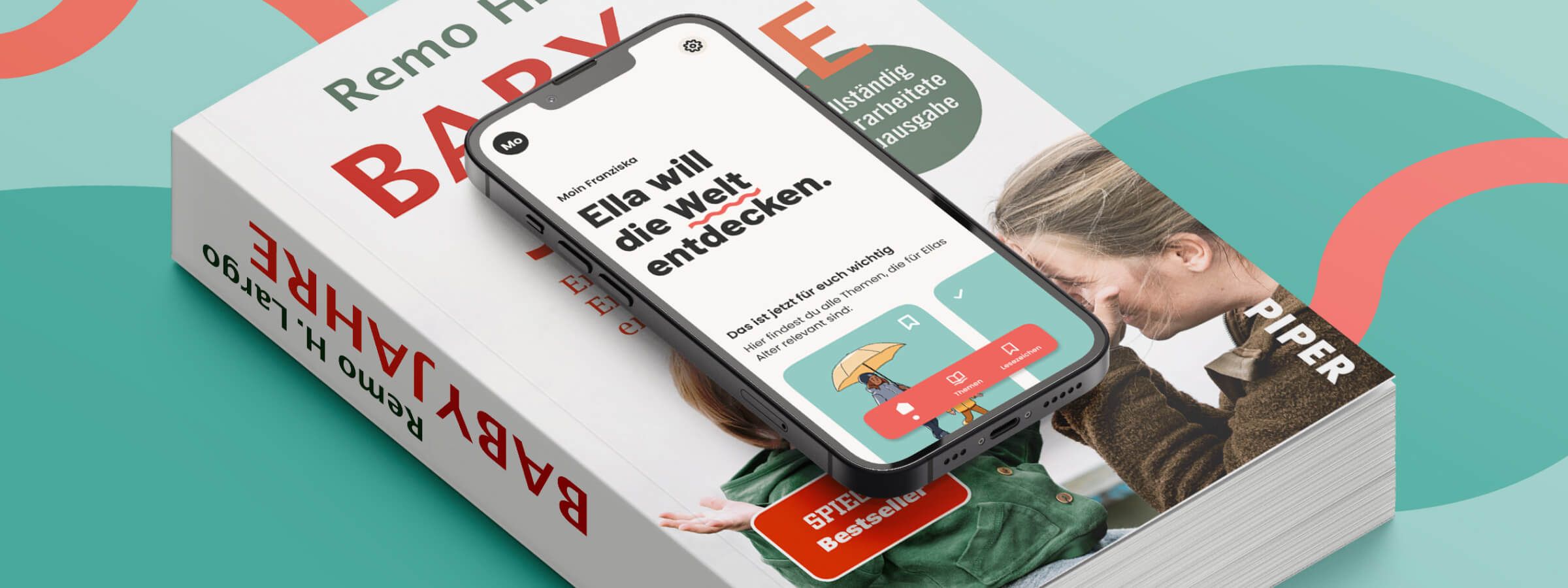 Die geöffnete Babyjahre App ist auf einem Smartphone zu sehen und liegt auf dem Buch Babyjahre